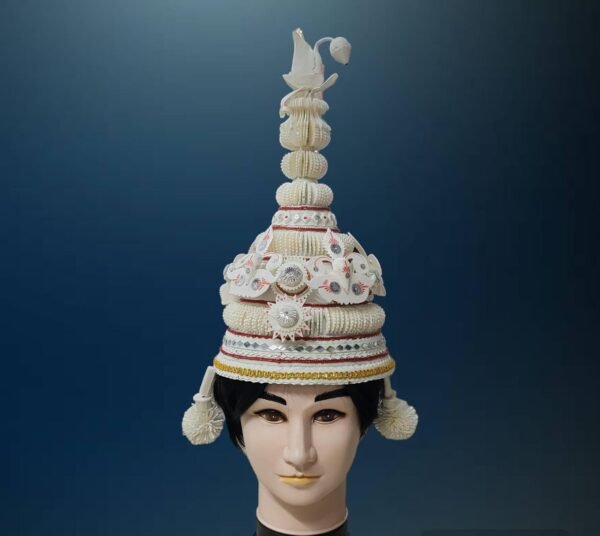 Shola Ghar’s Topor-Mukut Set is more than just an accessory, it’s a symbol of Bengal’s cultural pride and personal elegance. Our exquisite headgear is an essential addition to your wedding attire, embodying the rich cultural heritage of Bengal. In Shola Ghar’s Topor-Mukut Set, both bride’s and groom’s headgear are there, which has been traditionally worn by them as part of the Bengali Hindu wedding ceremony.