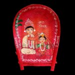 Boron Kulo is made up of bamboo skin. It is used in wedding rituals (as khoidaan and boron dala) and puja purposes.